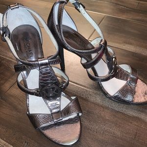 A very elegant silver pair of Michael Kors heels